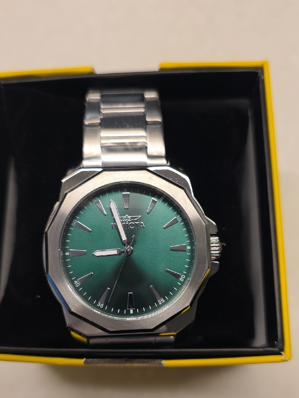 34. Invicta Silver Stainless Steel Watch with Green Dial
